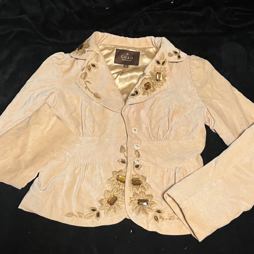 Stunning vintage Italian suede jacket with rhinestones fully in tact.